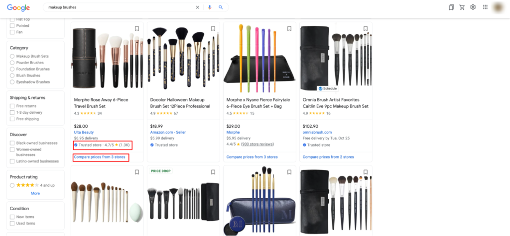 Page from Google Shopping tab for makeup brushes. Below the makeup brush product listing is Google’s Trusted Store badge. Underneath it is a prompt to compare prices from 2 other stores